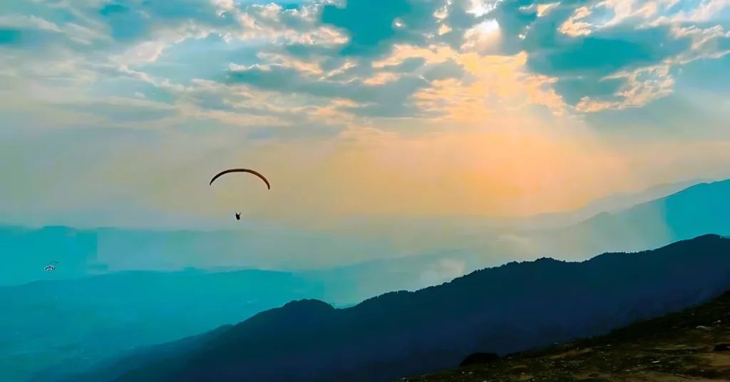 A thrilling paragliding adventure in the majestic mountains.